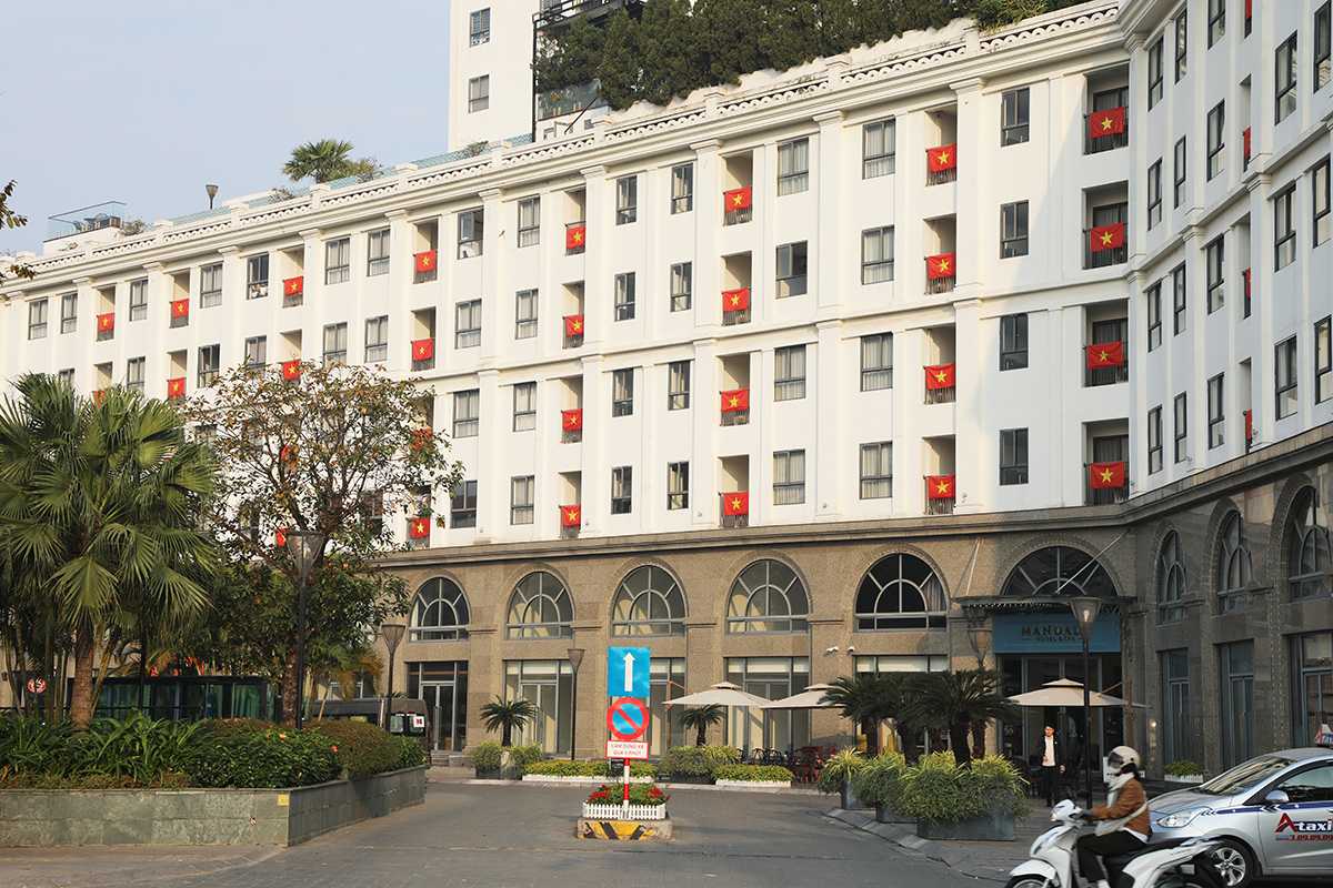 Nhieu khu chung cu, nha cao tang tai Bac Ninh nguoi dan to chuc treo co To quoc chao mung Dai hoi lan thu XIV cua Dang. Anh: Huu Thang  