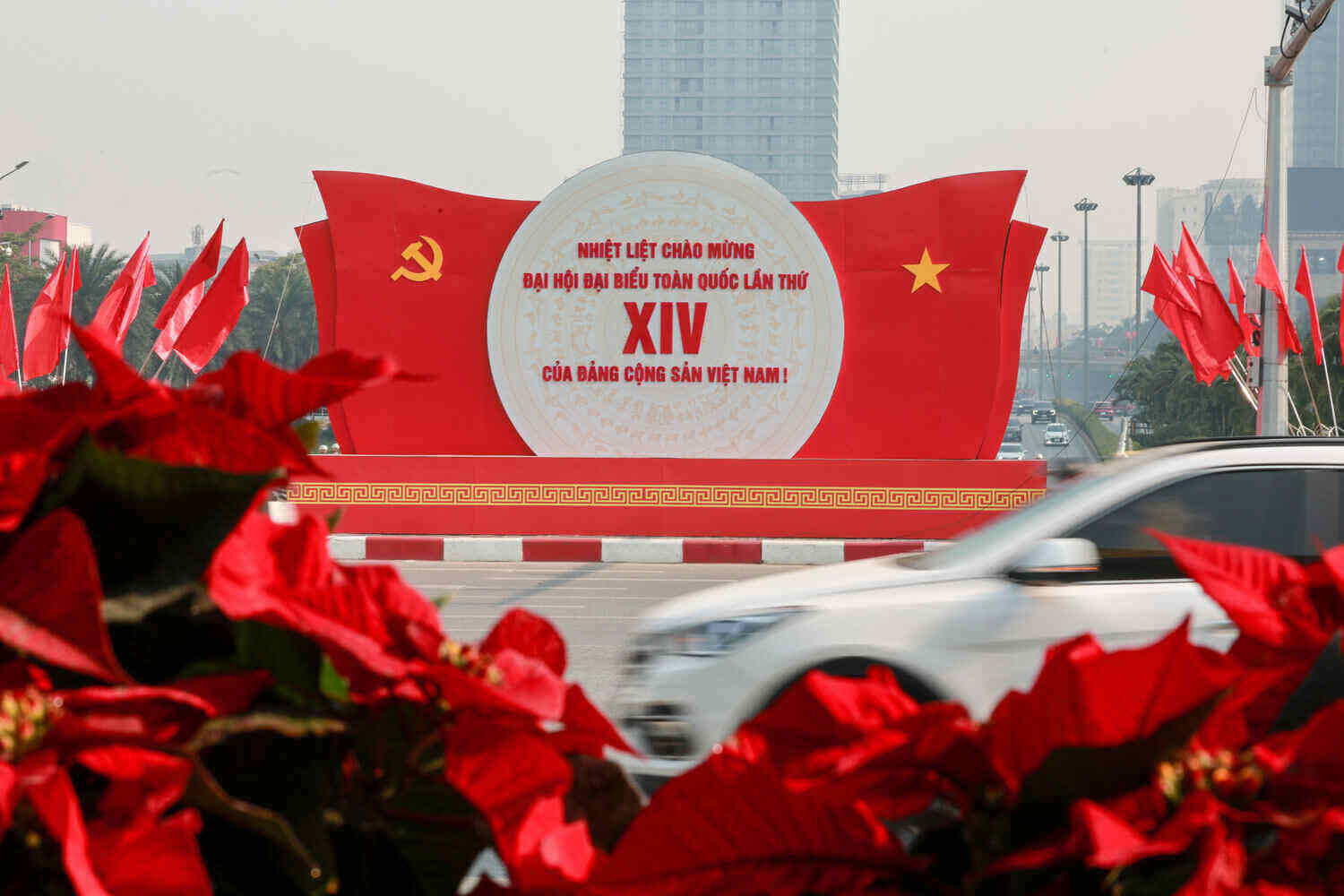 Flags and flowers to celebrate the 14th Party Congress fill Hanoi streets. Photo: Hai Nguyen