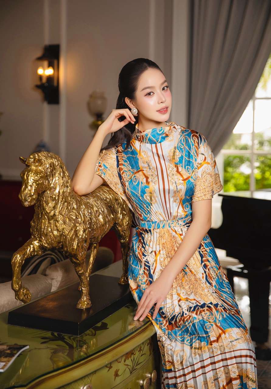 Hoa hau Thanh Thuy duyen dang trong cac thiet ke trang phuc Tet. Anh: Nghe si cung cap.