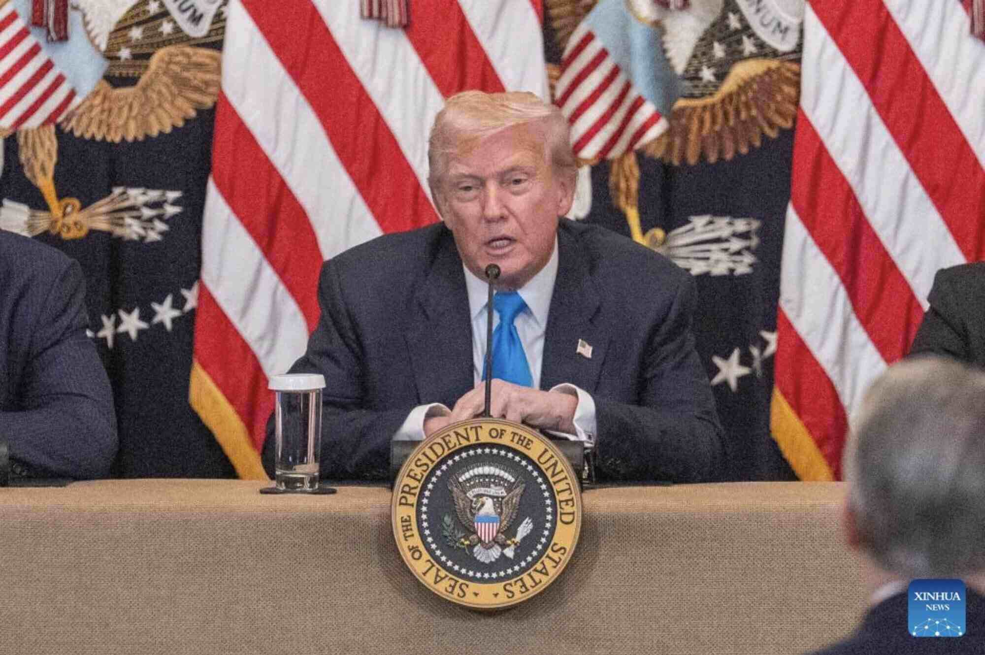 Mr. Trump speaks at a press conference. Photo: Xinhua