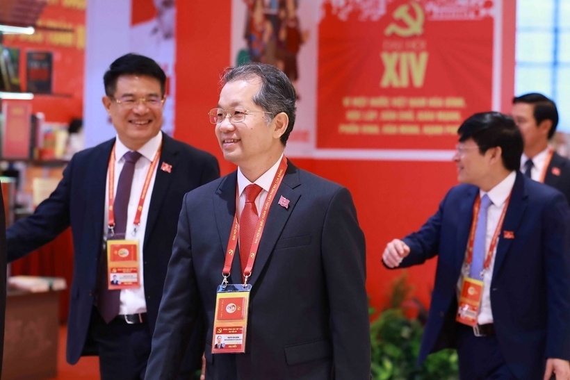 Uy vien Trung uong Dang, Chanh an Toa an nhan dan toi cao Nguyen Van Quang va Vien truong VKSND toi cao Nguyen Huy Tien toi du phien tru bi. Anh: TTXVN