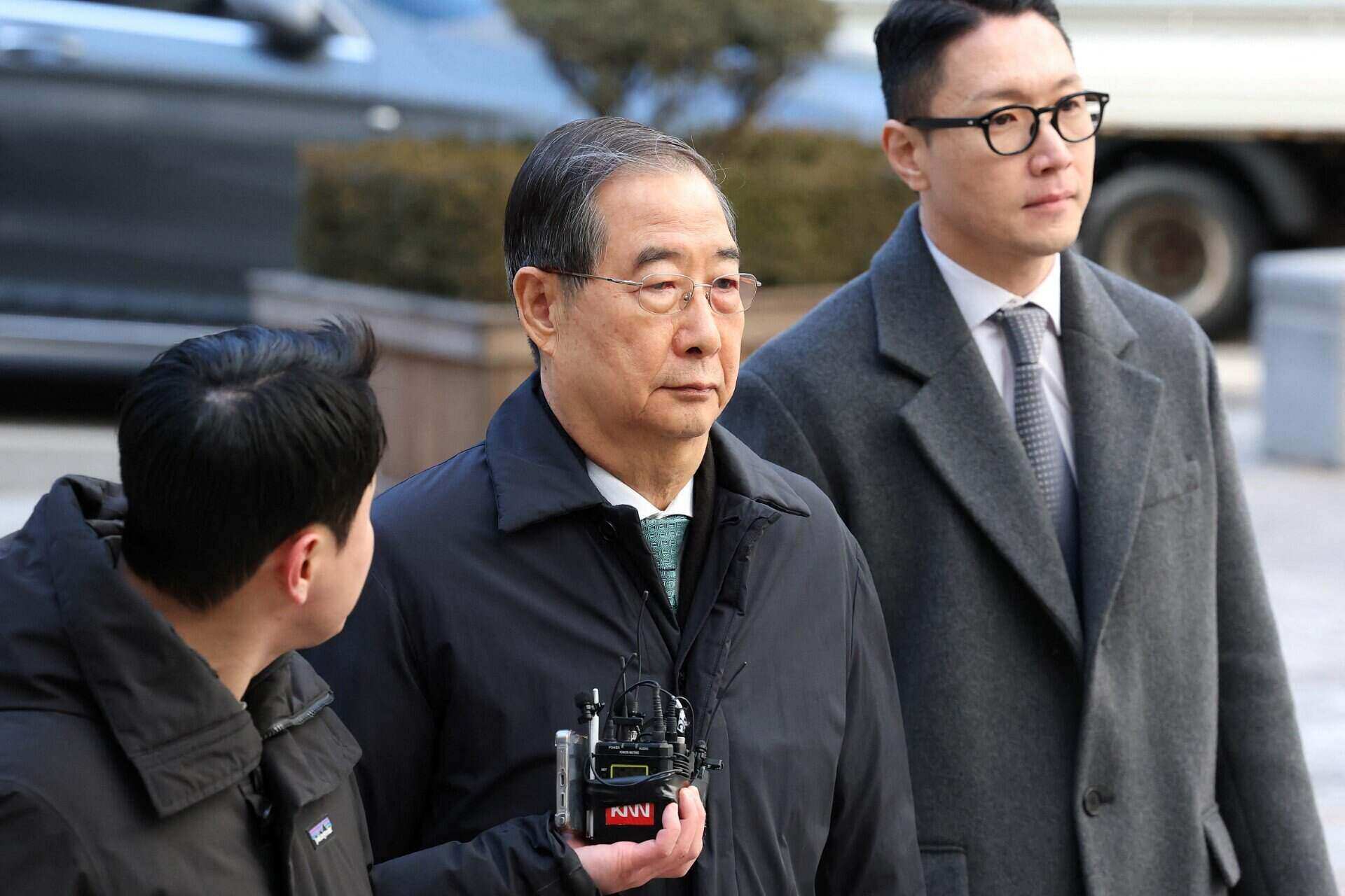 Former South Korean Prime Minister Han Duck Soo arrived at the Seoul District Court to attend the first court hearing in the rebellion case in Seoul on January 21, 2026. Photo: AFP