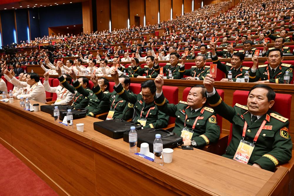 The 14th National Congress of Delegates voted and decided to approve the adjustment of the Congress program on the afternoon of January 21. Photo: Duy Linh