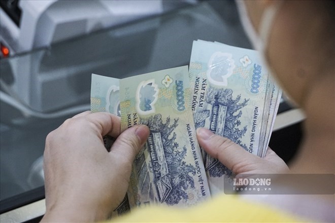 La loi sur la transformation numerique stipule que l'Etat autorise l'utilisation d'au moins 1% du budget pour la transformation numerique. Photo: Hai Nguyen.