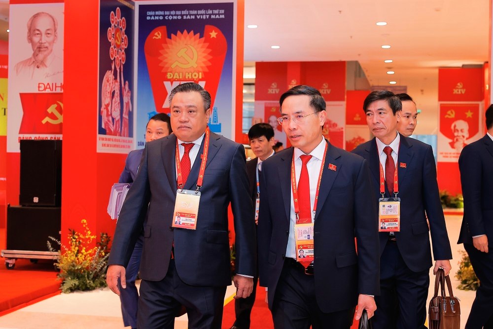 Uy vien Trung uong Dang, Chu nhiem Uy ban Kiem tra Trung uong Tran Sy Thanh va cac dai bieu den du ngay lam viec chinh thuc thu ba Dai hoi XIV cua Dang. Anh: TTXVN