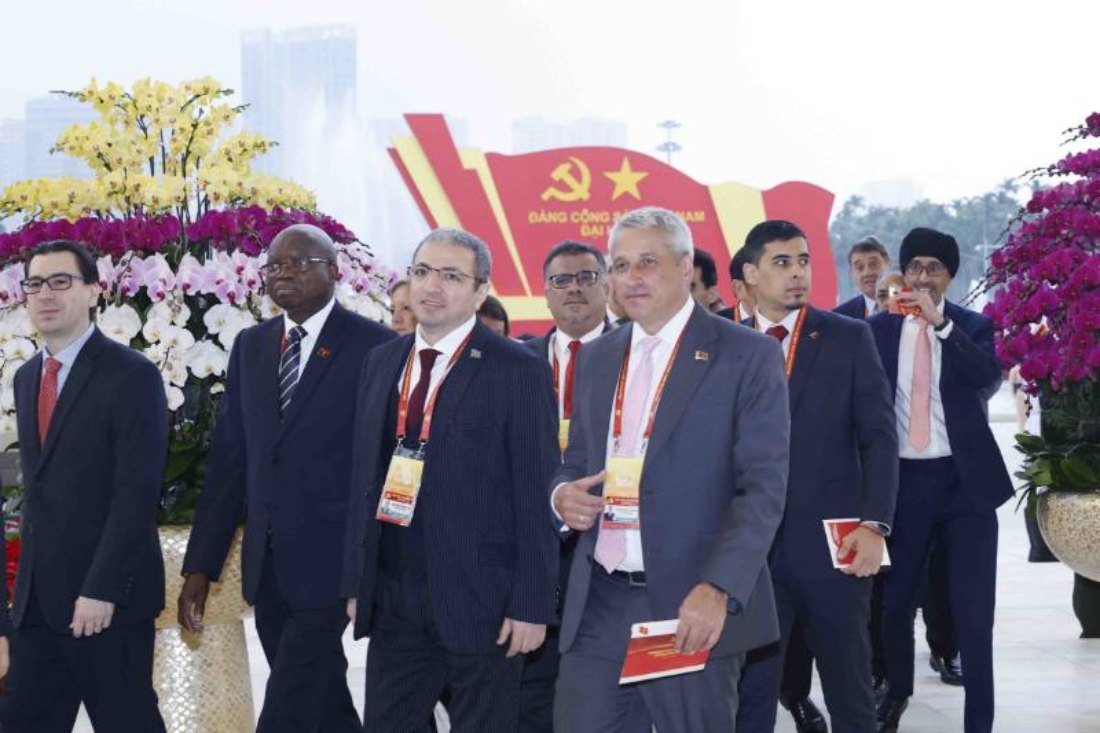 International delegates attend the opening session of the 14th Party Congress. Photo: VNA