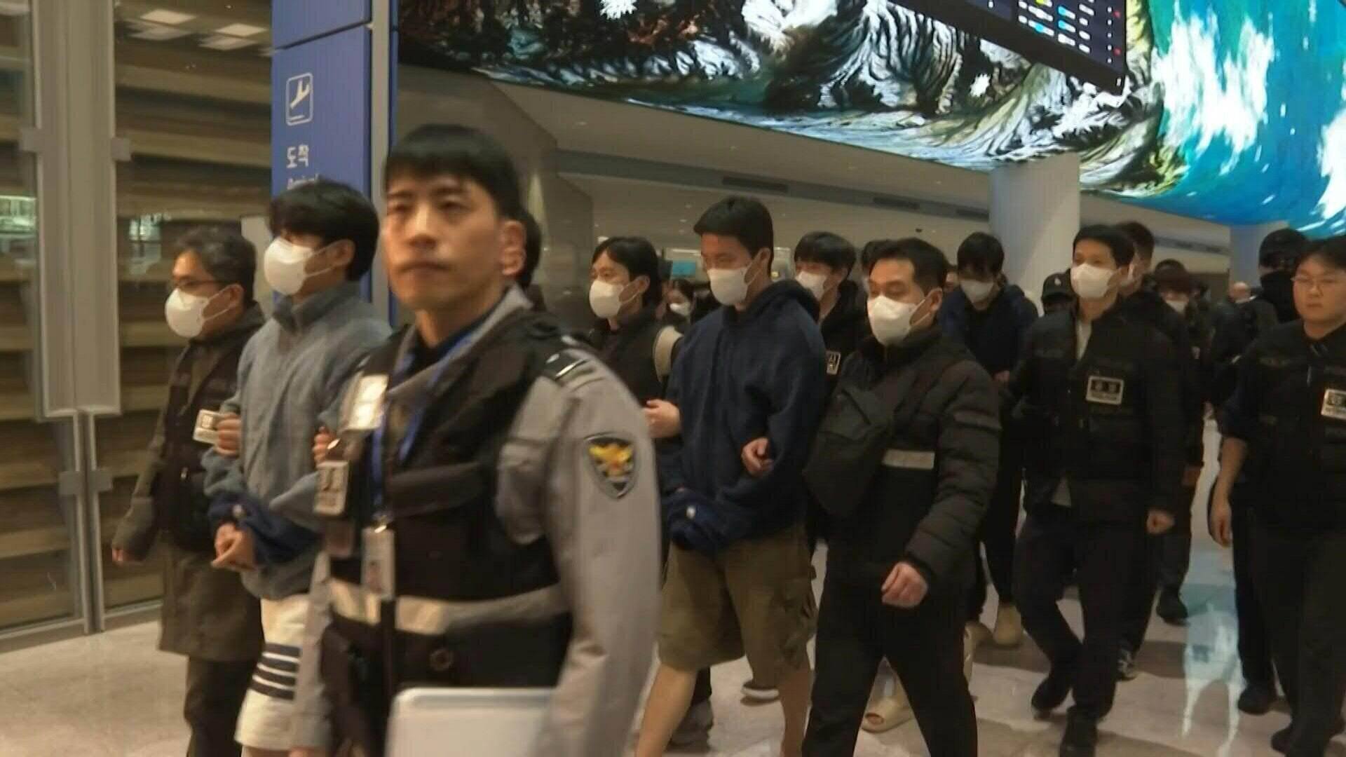 South Korean police bring suspected fraud in Cambodia back home. Photo: AFP
