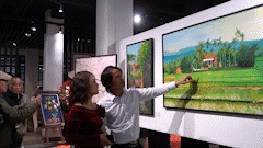 Admire the colors of spring in the highlands through paintings in Hanoi's Old Quarter.