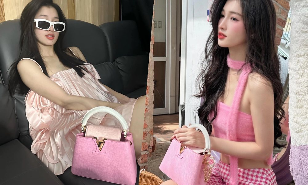 A hau Phuong Nhi chuong tui mau hong cua Louis Vuitton. Anh: Cat tu video.