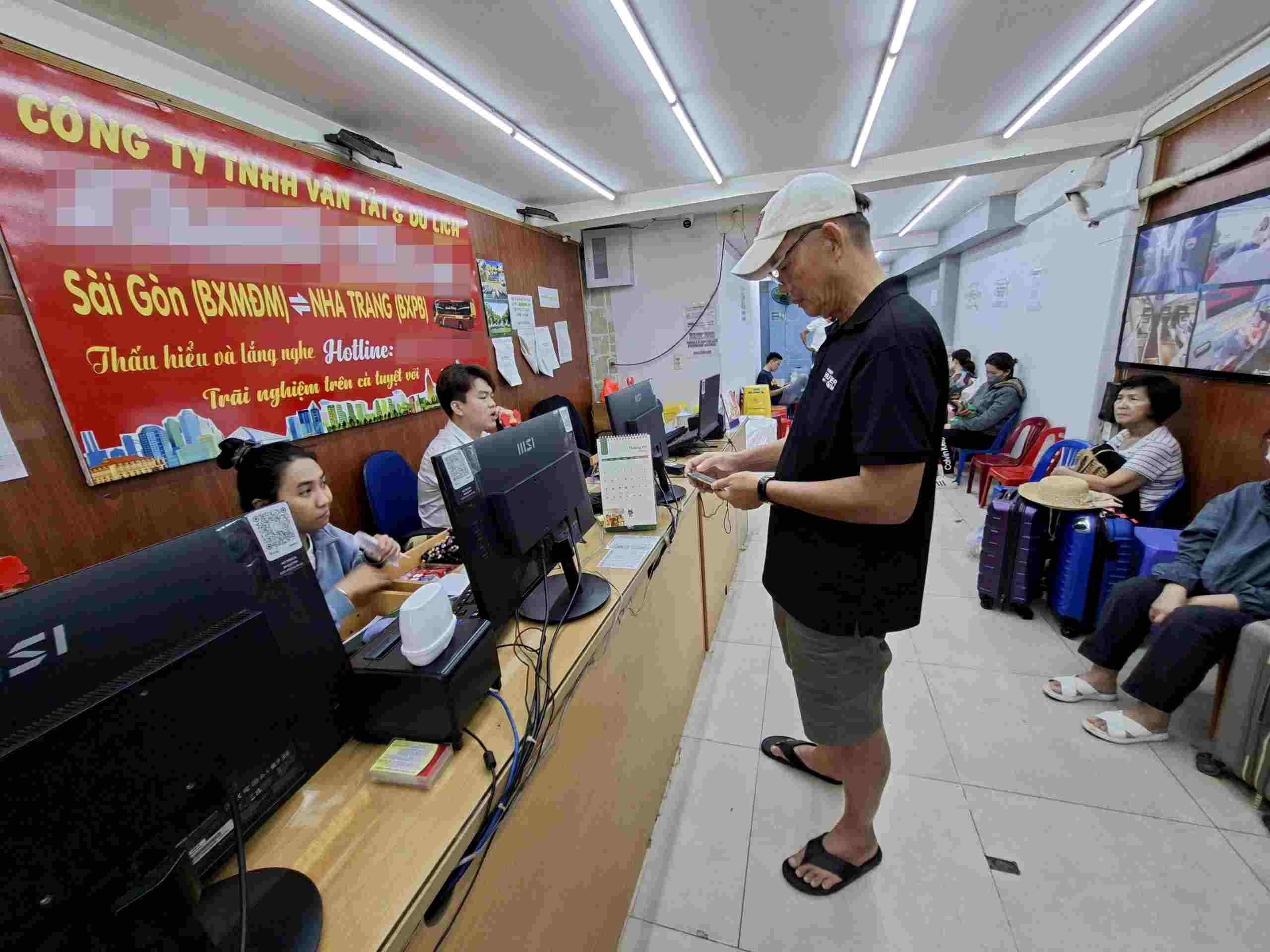 K.P bus company on Pham Ngu Lao street (HCMC) sells Tet bus tickets twice as high as usual days. Photo: Minh Quan