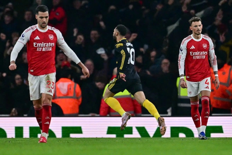 Tran thua Man United se anh huong rat lon den Arsenal.  Anh: AFP