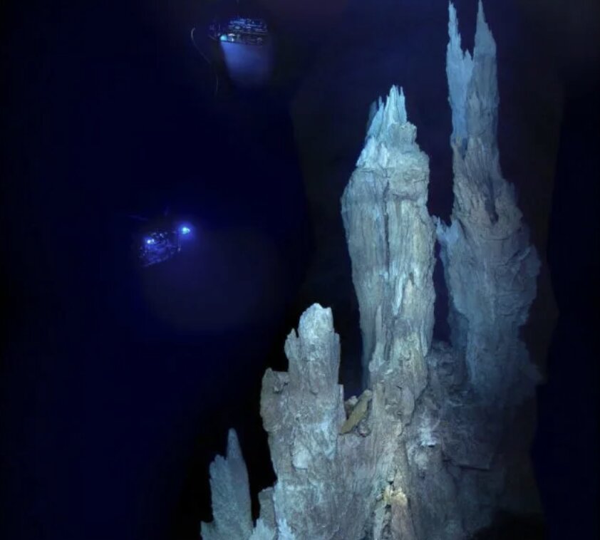 Remote-controlled diving equipment illuminates the stone towers in the missing city. Photo: NOAA