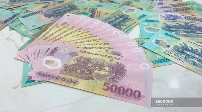 The 13-month term interest rate is up to 8.3%/year. Photo: Tra My