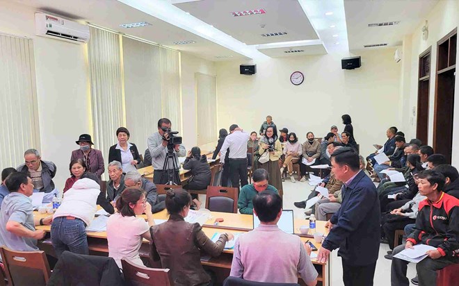 Tinh Lam Dong chi tra tien den bu cho cac ho dan co dat bi thu hoi phuc vu cao toc Bao Loc - Lien Khuong. Anh: Phuc Khanh 