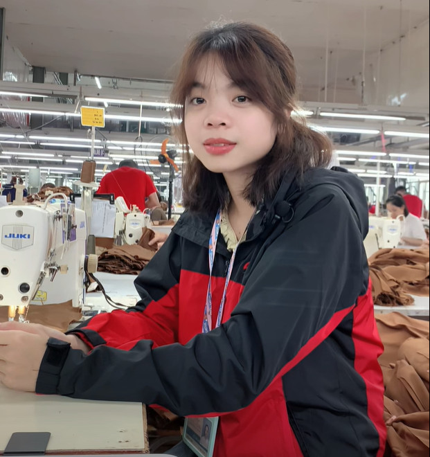 Chi Nguyet cho biet, tien luong thang dong bao hiem xa hoi tang cao se dam bao nhieu quyen loi cho nguoi lao dong. Anh: Minh Huong. 