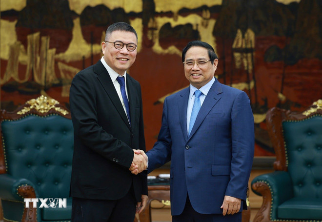 Prime Minister Pham Minh Chinh receives Mr. Hong Thien Chuc, Chairman of Texhong Group (China). Photo: VNA