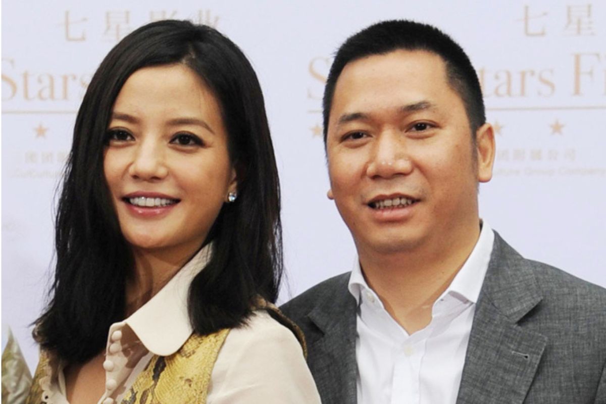 Triệu Vy và chồng cũ Huỳnh Hữu Long. Ảnh: Xinhua