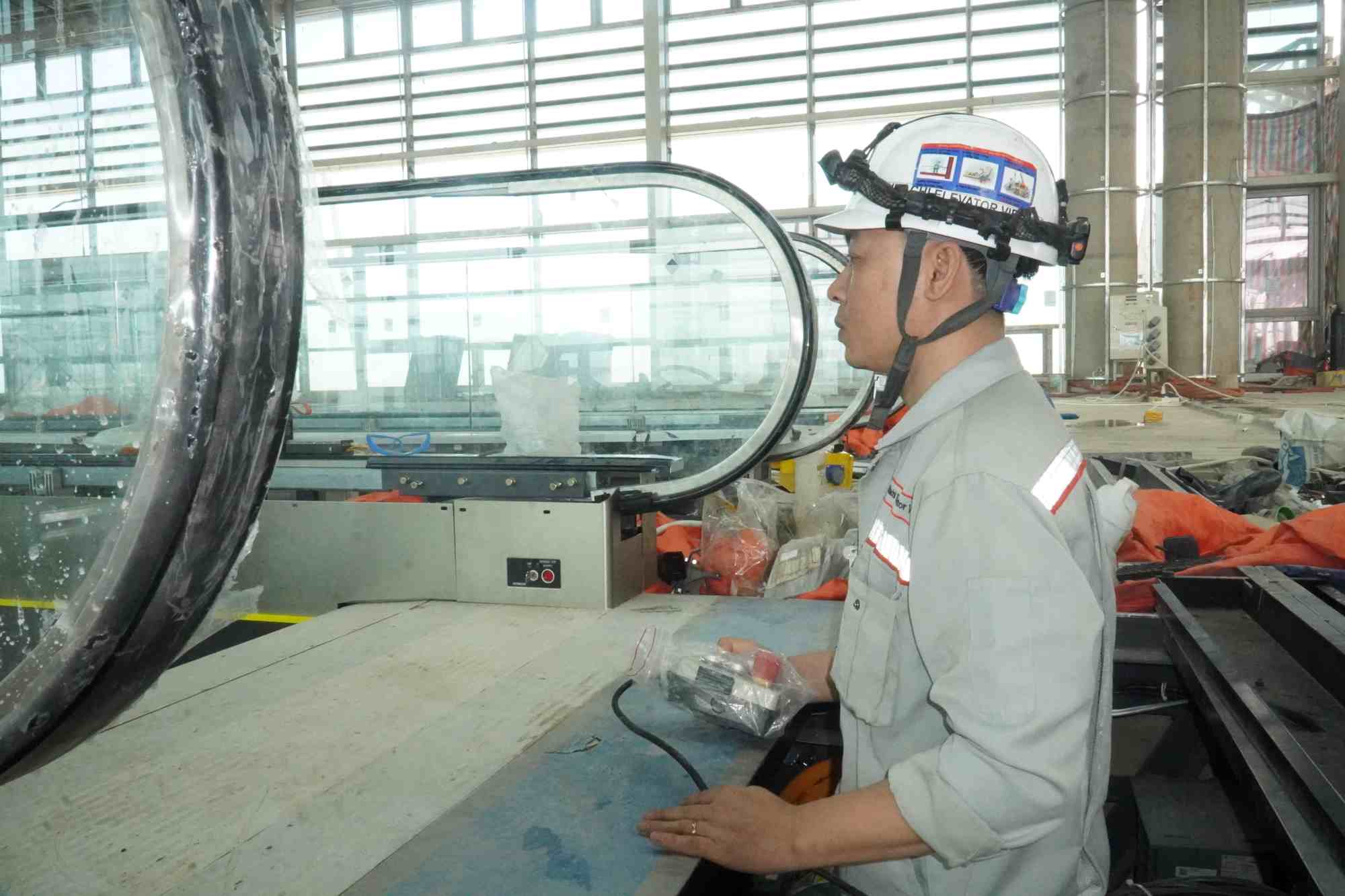 Workers constructing at Long Thanh airport passenger terminal. Photo: HAC
