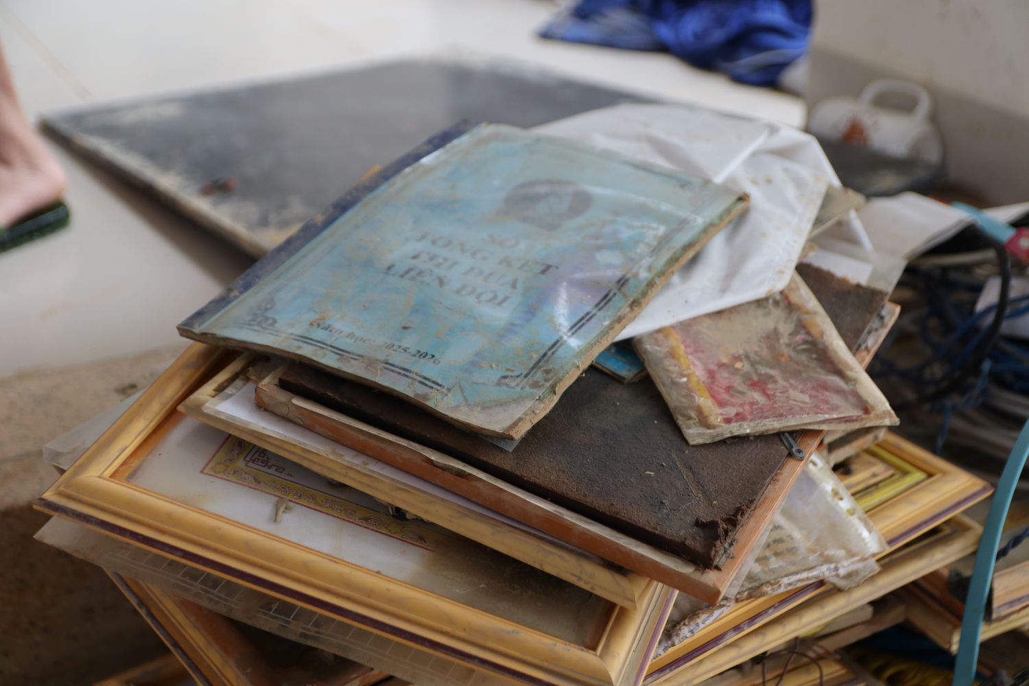 During the recent floods, many families in Khanh Hoa lost and damaged land use right certificates (red books). Photo: Phuong Linh