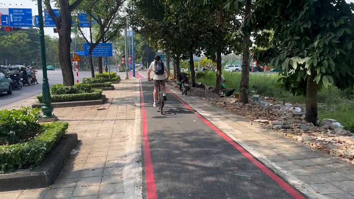 International tourists experience the first bicycle lane in Ho Chi Minh City.