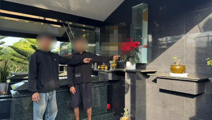 Two subjects stealing property at the cemetery are being handled by functional forces. Photo: Police provided