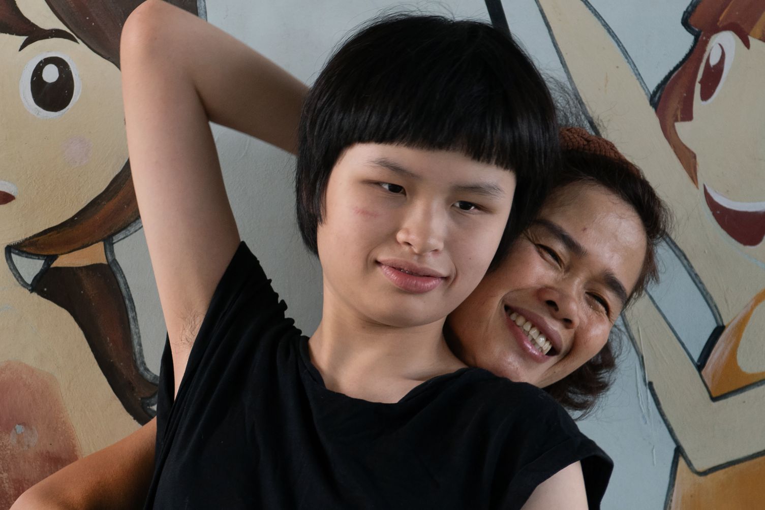 In the arms of mother's love. Photo: Viet Van