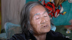 Severe cold covers Hanoi, poor workers huddle in a house patched with tarpaulin.