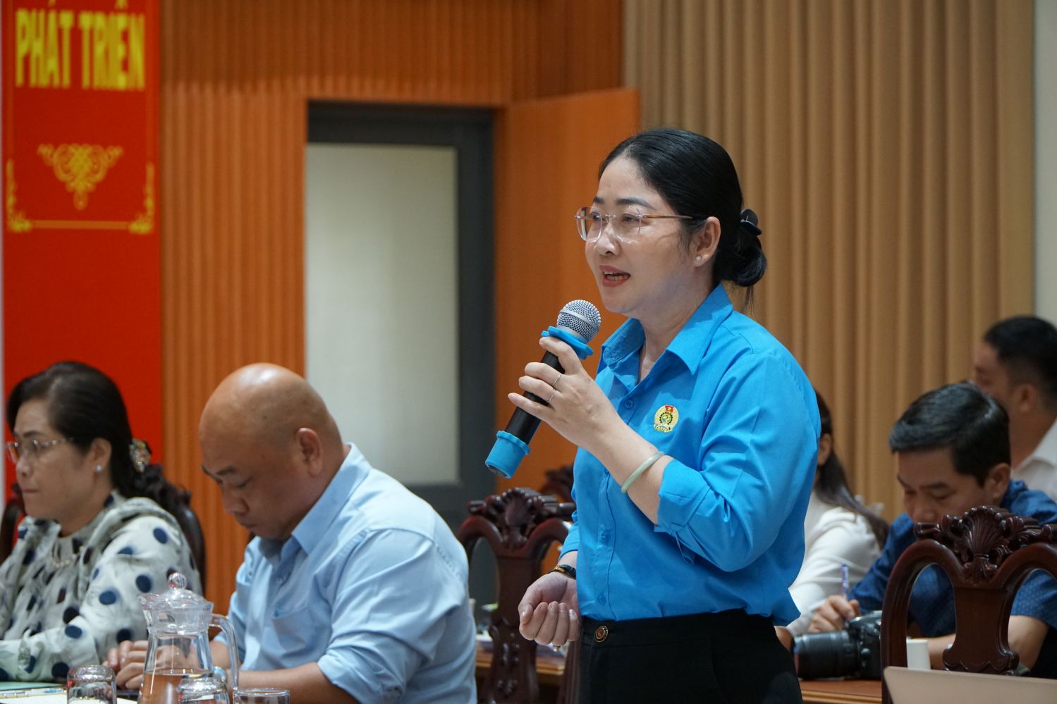 Ba Nguyen Kim Loan - Pho Chu tich Lien doan Lao dong TPHCM phat bieu tai hoi nghi. Anh: Thanh Chan