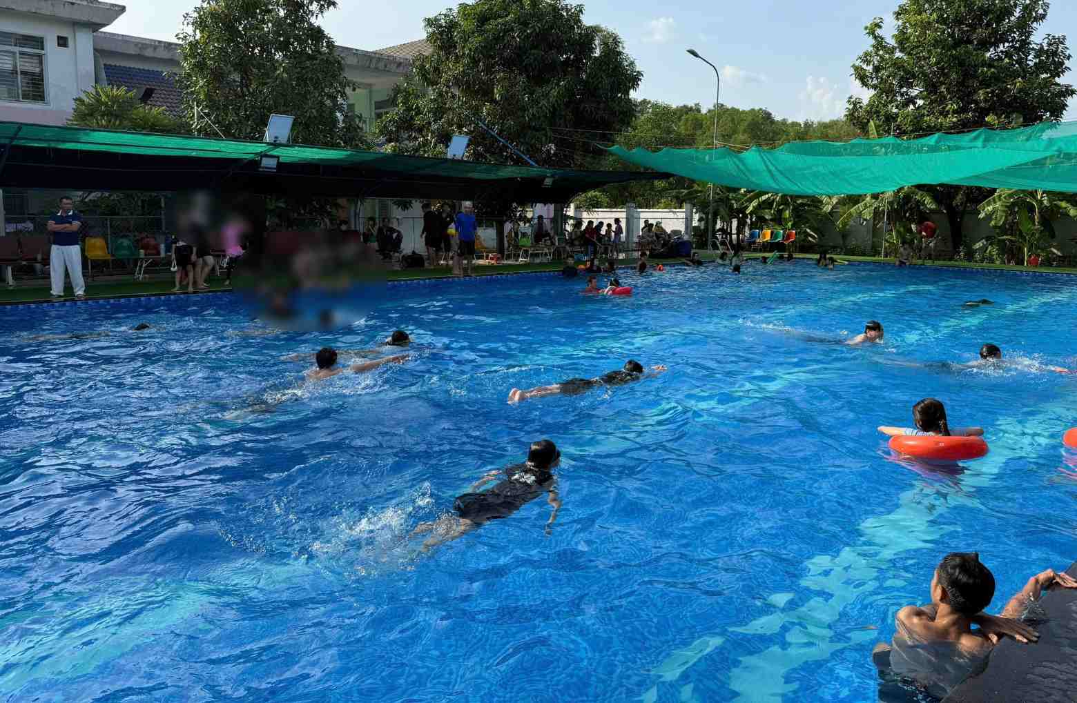 Free swimming lessons for 100 students who are children of workers in ...