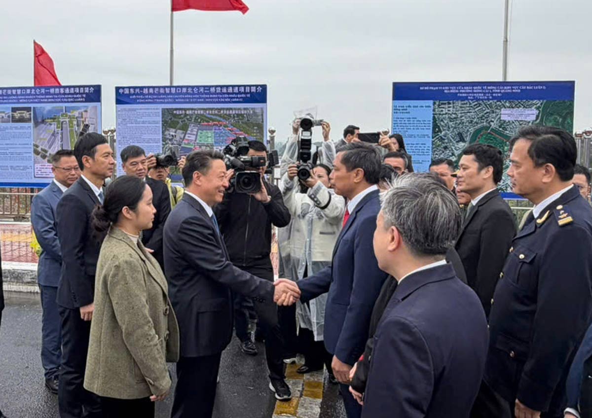 Delegates from 2 localities Quang Ninh (Vietnam) and Choang Autonomous Region, Guangxi (China) meet at the event. Photo: Thanh Tung