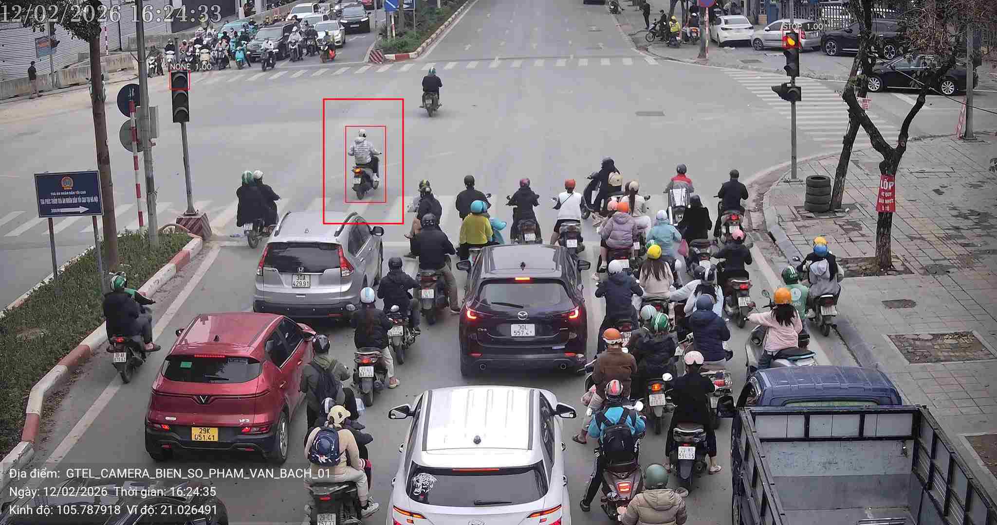 Motorbikes running red lights are recorded by AI cameras for traffic tickets. Photo: Police provided