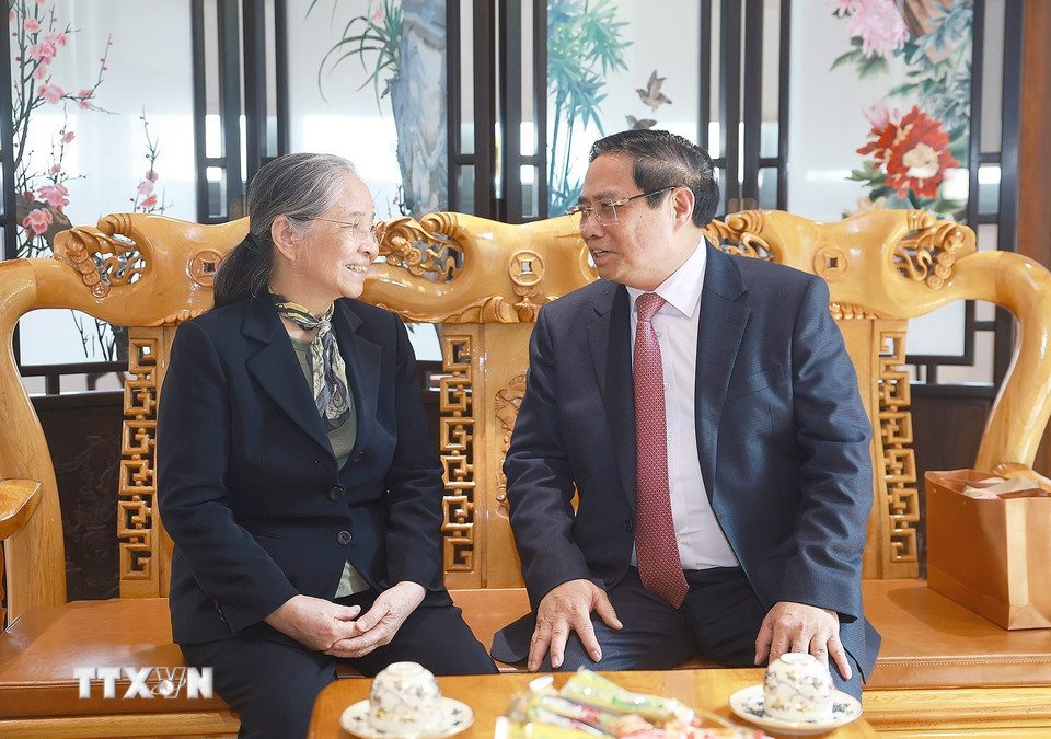 Thủ tướng Chính phủ Phạm Minh Chính thăm, chúc Tết gia đình cố Tổng Bí thư Nguyễn Phú Trọng. Ảnh: TTXVN 