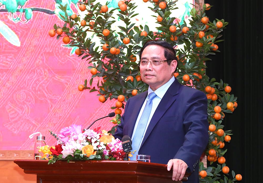 Prime Minister Pham Minh Chinh speaks at a working session with the Ministry of Culture, Sports and Tourism on the afternoon of February 23. Photo: Tran Huan