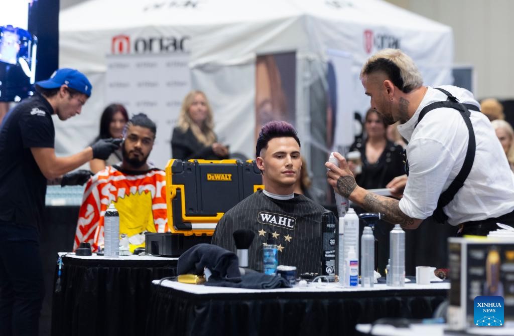 Not only women, men also face pressure about beauty and appearance. Photo: Xinhua