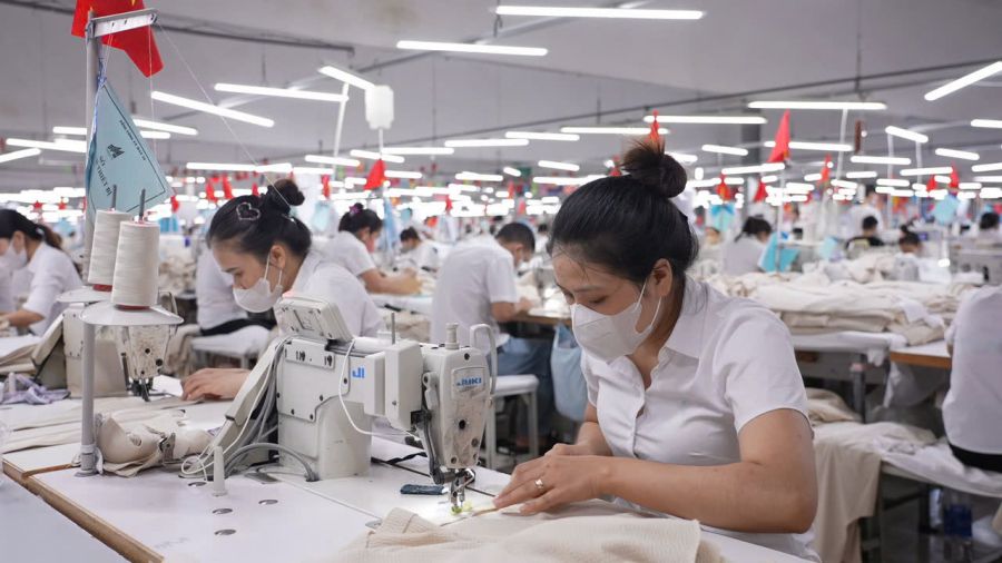 Workers at Ha Quang Garment Enterprise return to work after the Lunar New Year. Photo: Cong Sang