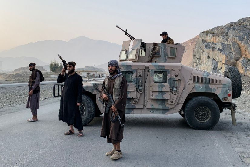 Taliban security forces stand guard near the Torkham border crossing between Afghanistan and Pakistan on February 27. Photo: AFP