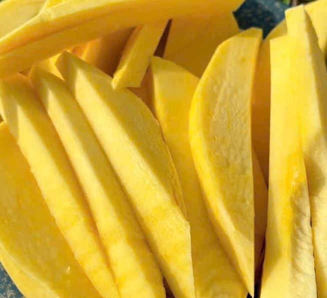 Mangoes can help reduce blood fat and stabilize blood sugar when eaten at the right time. Photo: Kieu Vu