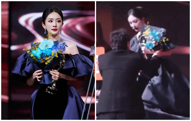 Thẩm Đằng bất ngờ bật dậy, lao lên sân khấu để đỡ Dương Mịch bước xuống. Ảnh cắt từ video 