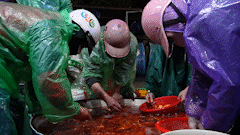 Bustling fish market in Hanoi during the Ong Cong Ong Tao worshiping season.