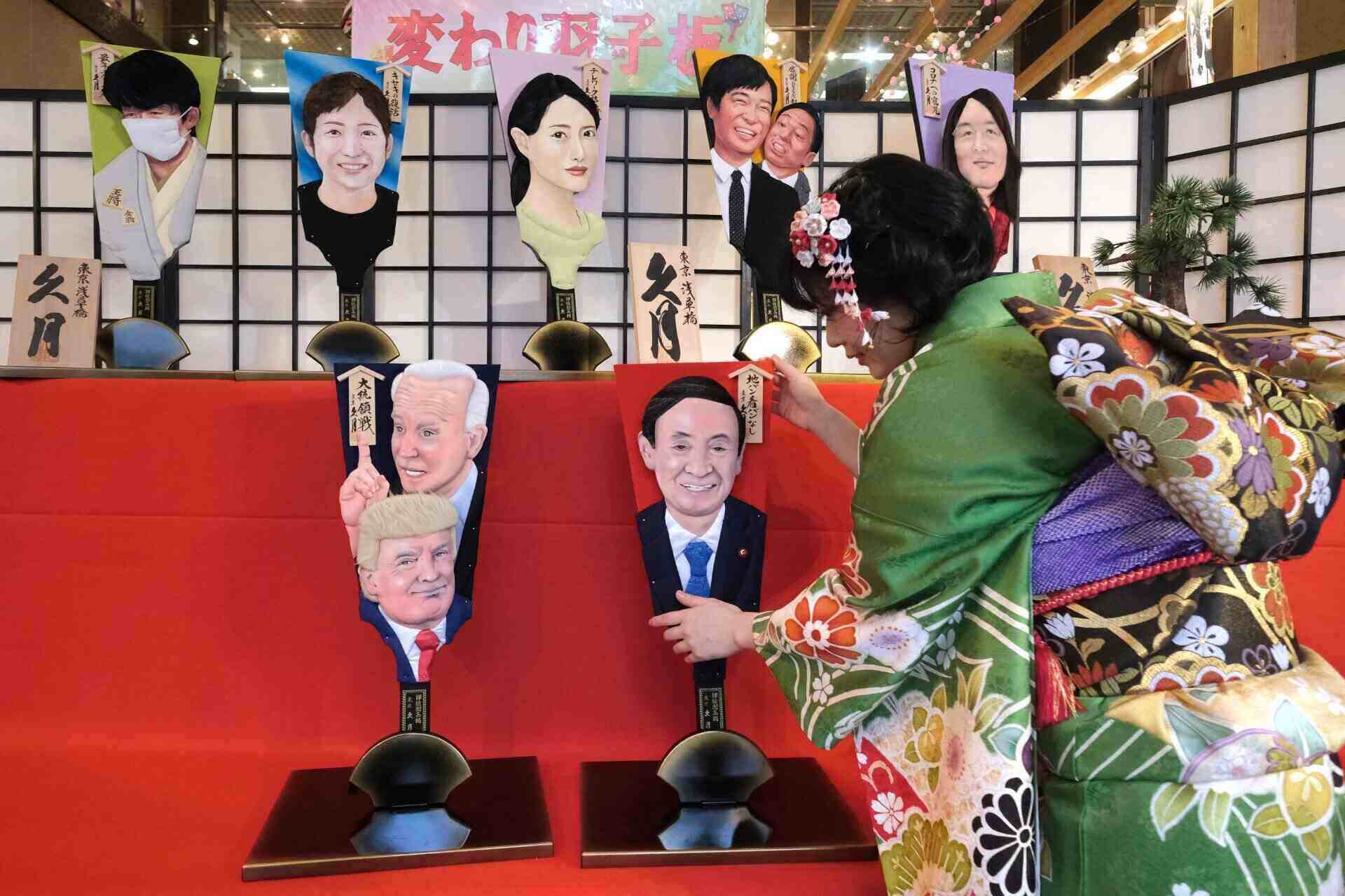 Wooden racket playing the Hagoita game with celebrity images in Japan. Photo: AFP