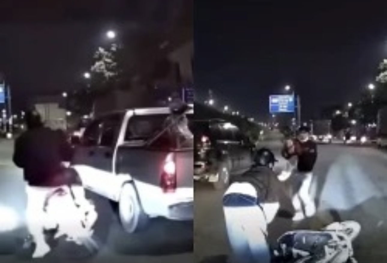 Hình ảnh ô tô bán tải tạt đầu xe máy ở Hà Nội. Ảnh cắt từ clip