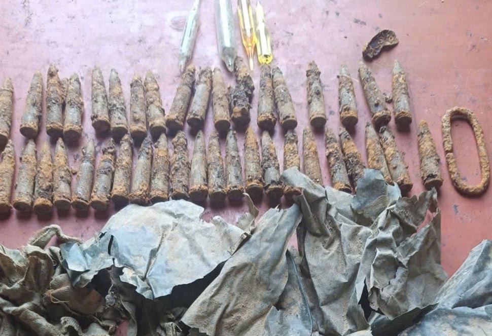Many bullets were discovered along with a martyr's remains in Laos. Photo: Hoang Anh