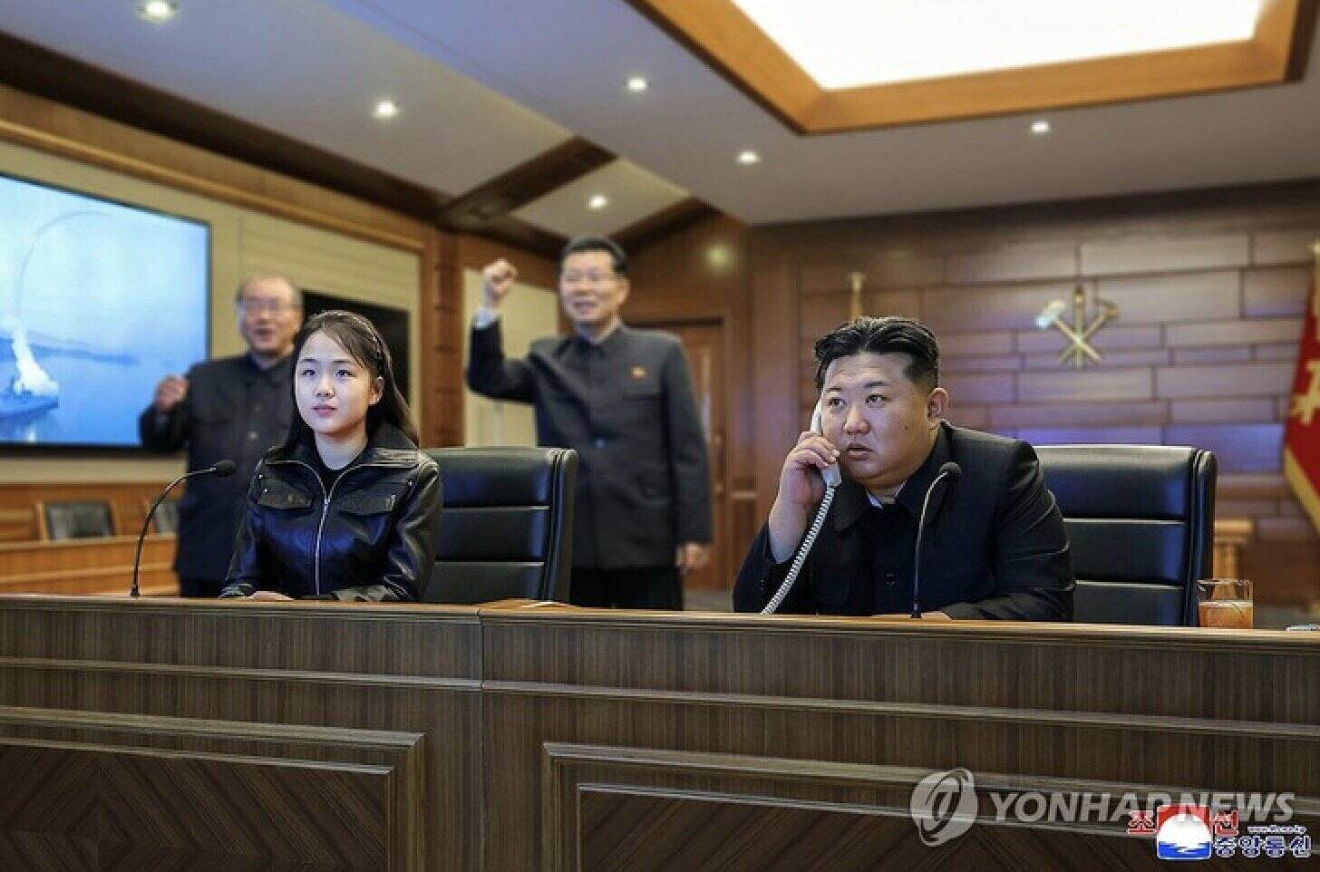 North Korean President Kim Jong Un and his daughter monitor the missile test from the destroyer Choe Hyon. Photo: KCNA