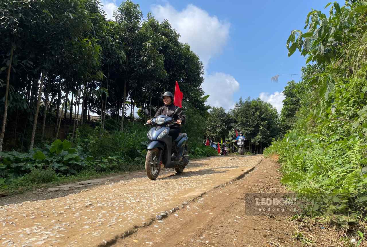 Mobile propaganda motorbikes weave through each village to inform people about the election. Photo: Duy Khanh.