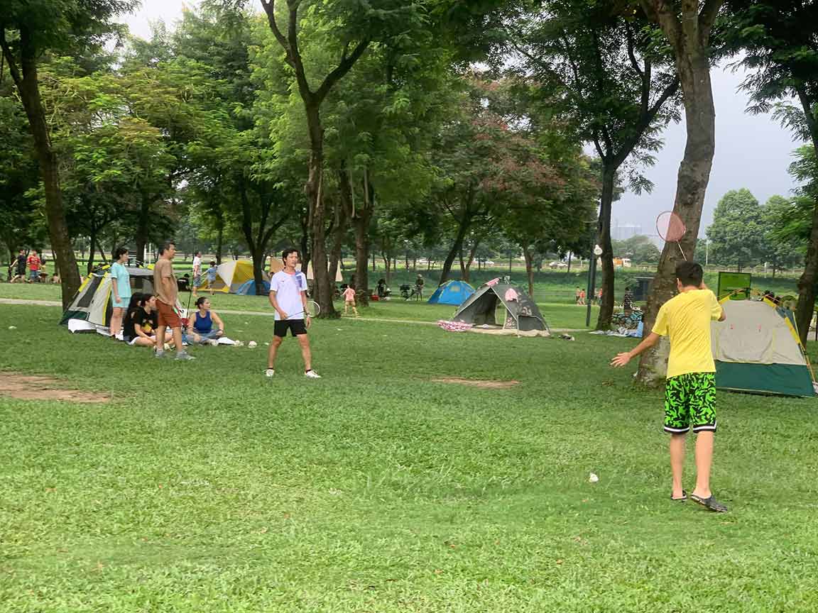 The green space in the park has become a familiar relaxing spot for families. Photo: Nhat Minh