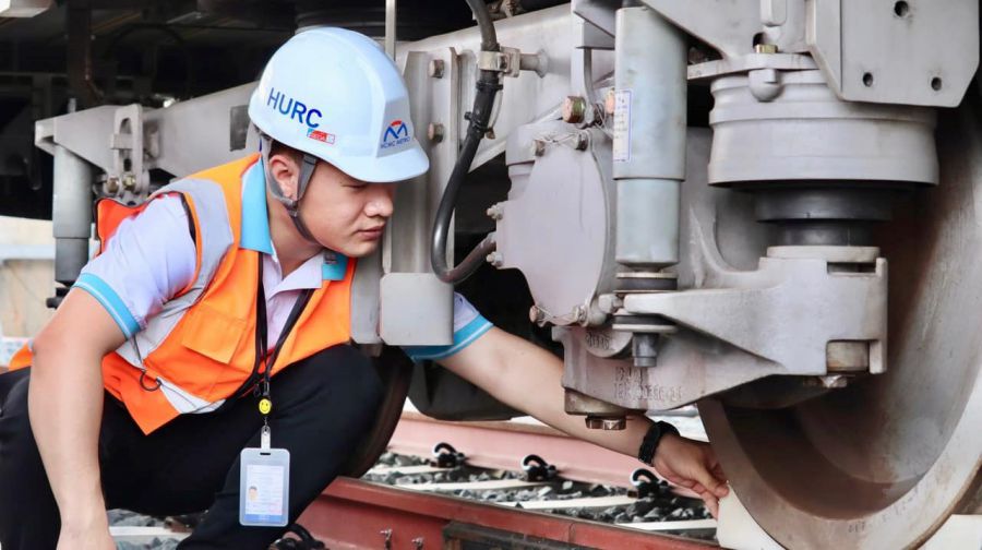 Workers operating Metro Line No. 1 HCMC. Photo by Minh Quan
