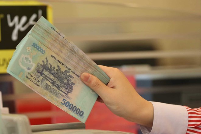 The Tax Department has clarified the cases of mandatory bank transfer payment for salary payments from 5 million VND. Illustrative photo: Hai Nguyen