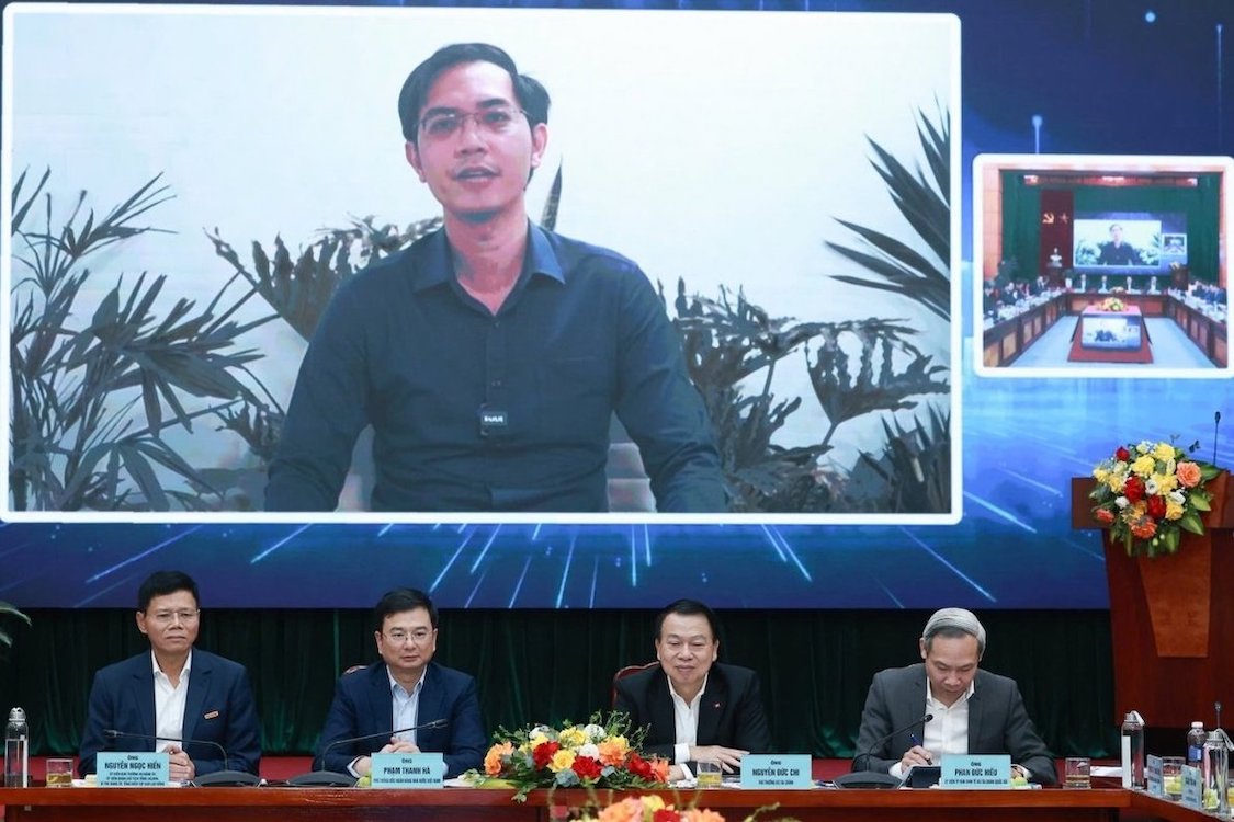 PGS.TS Nguyễn Hữu Huân - Phó Chủ tịch Cơ quan Điều hành Trung tâm Tài chính Quốc tế Việt Nam tại TP Hồ Chí Minh, đang tham dự trực tuyến. Ảnh: Hải Nguyễn 