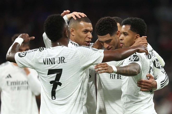 Vinicius và các đồng đội tiếp tục gieo sầu cho Man City.  Ảnh: AFP