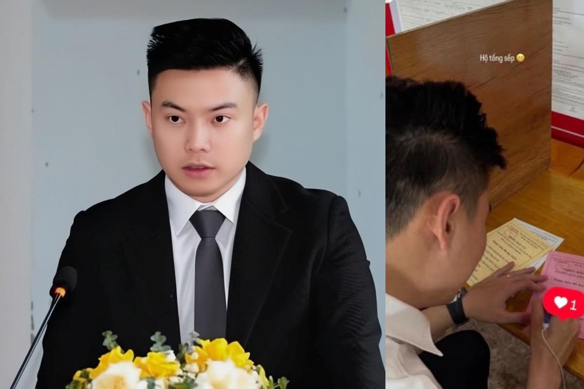 Khoảnh khắc Đỗ Thị Hà “hộ tống sếp” đi bỏ phiếu. Ảnh: Cắt từ video.